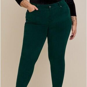 Green skinny corduroy pants.